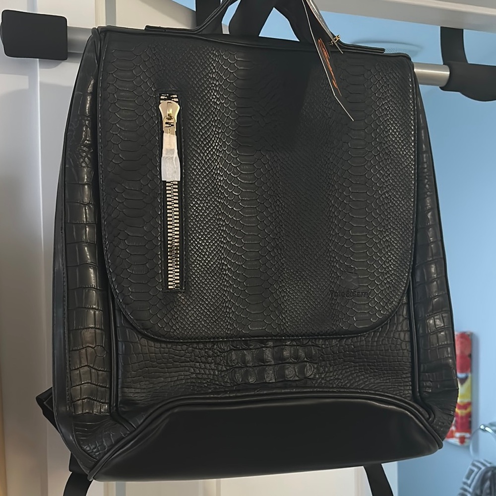 Genuine Leather Embossed BackPack by Tote & Carry